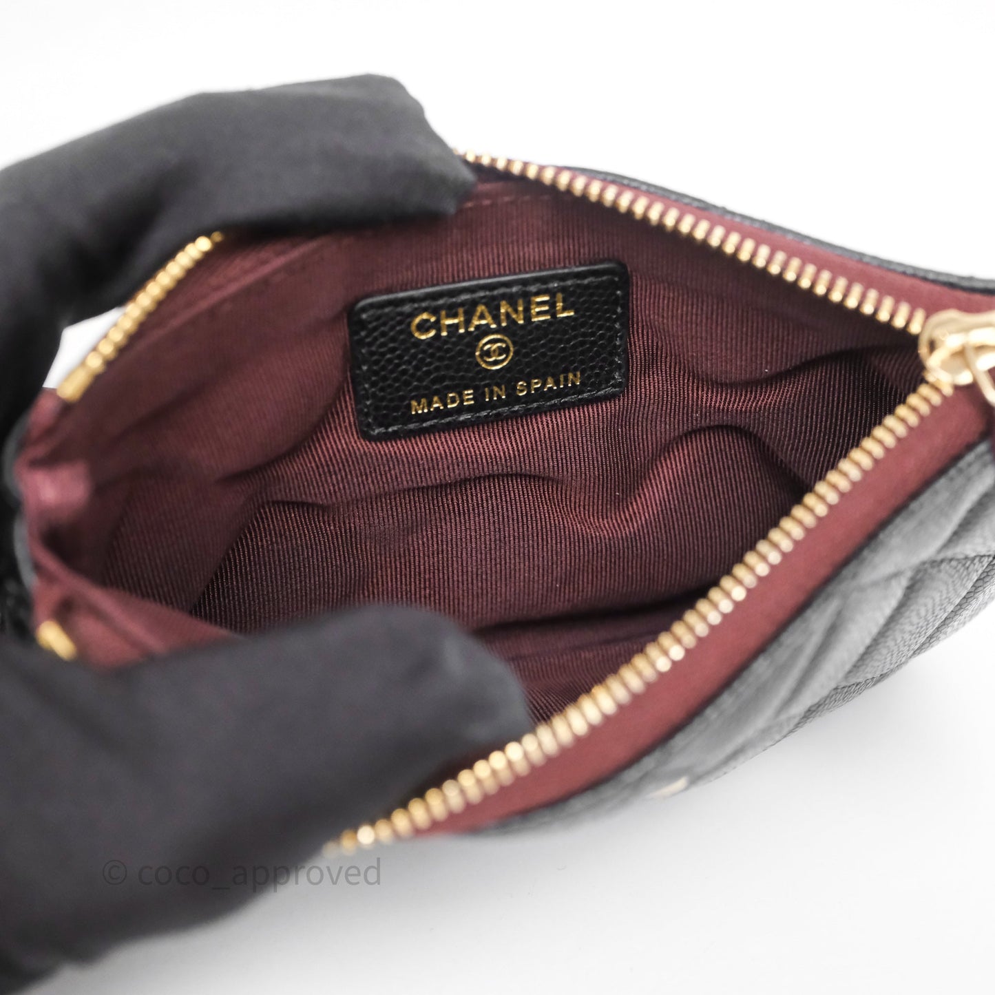 Chanel Quilted Mini O case Black Caviar Gold Hardware