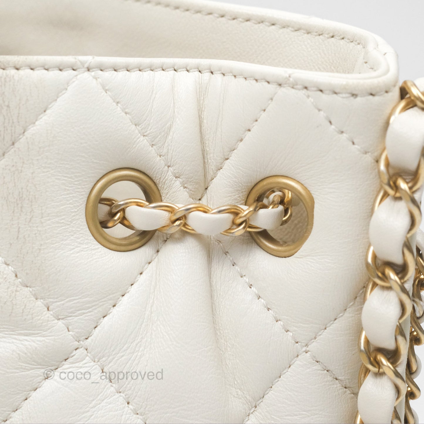Chanel Quilted Drawstring Bucket Bag Ivory Lambskin Aged Gold Hardware