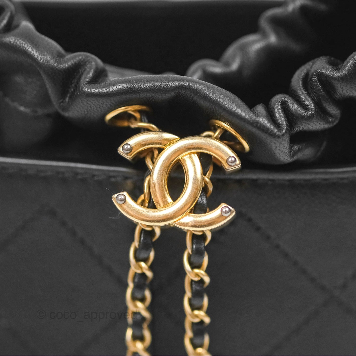 Chanel Drawstring Bucket Bag Quilted Black Caviar Aged Gold Hardware