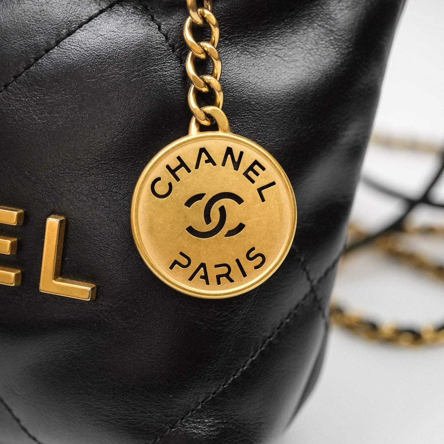 Chanel 22 Mini Bag Black Shiny Crumpled Calfskin Aged Gold Hardware