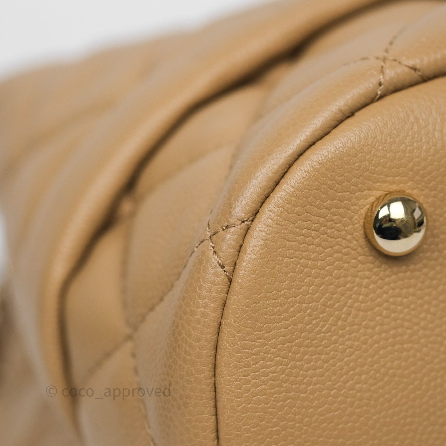 Chanel Rolled Up Bucket Drawstring Bag Beige Caviar Gold Hardware