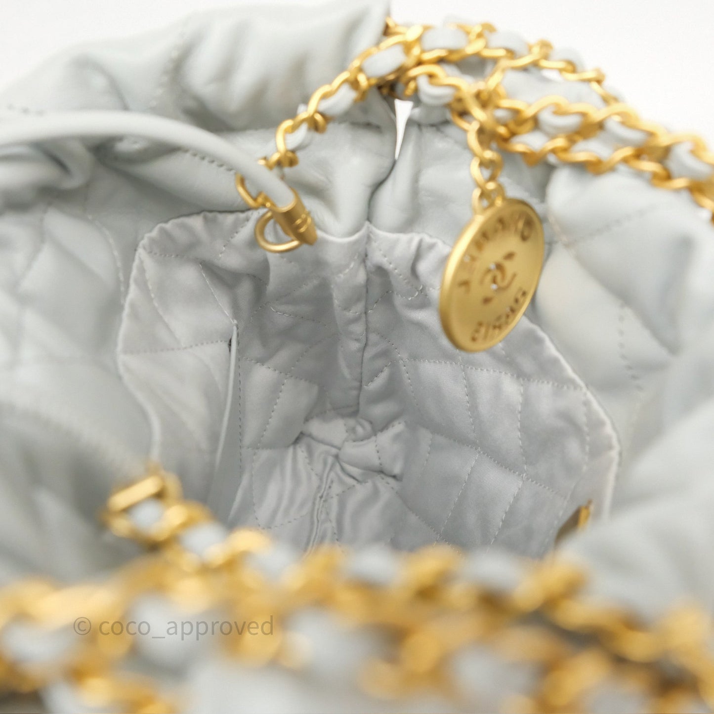 Chanel 22 Mini Bag Light Blue Shiny Crumpled Calfskin Aged Gold Hardware