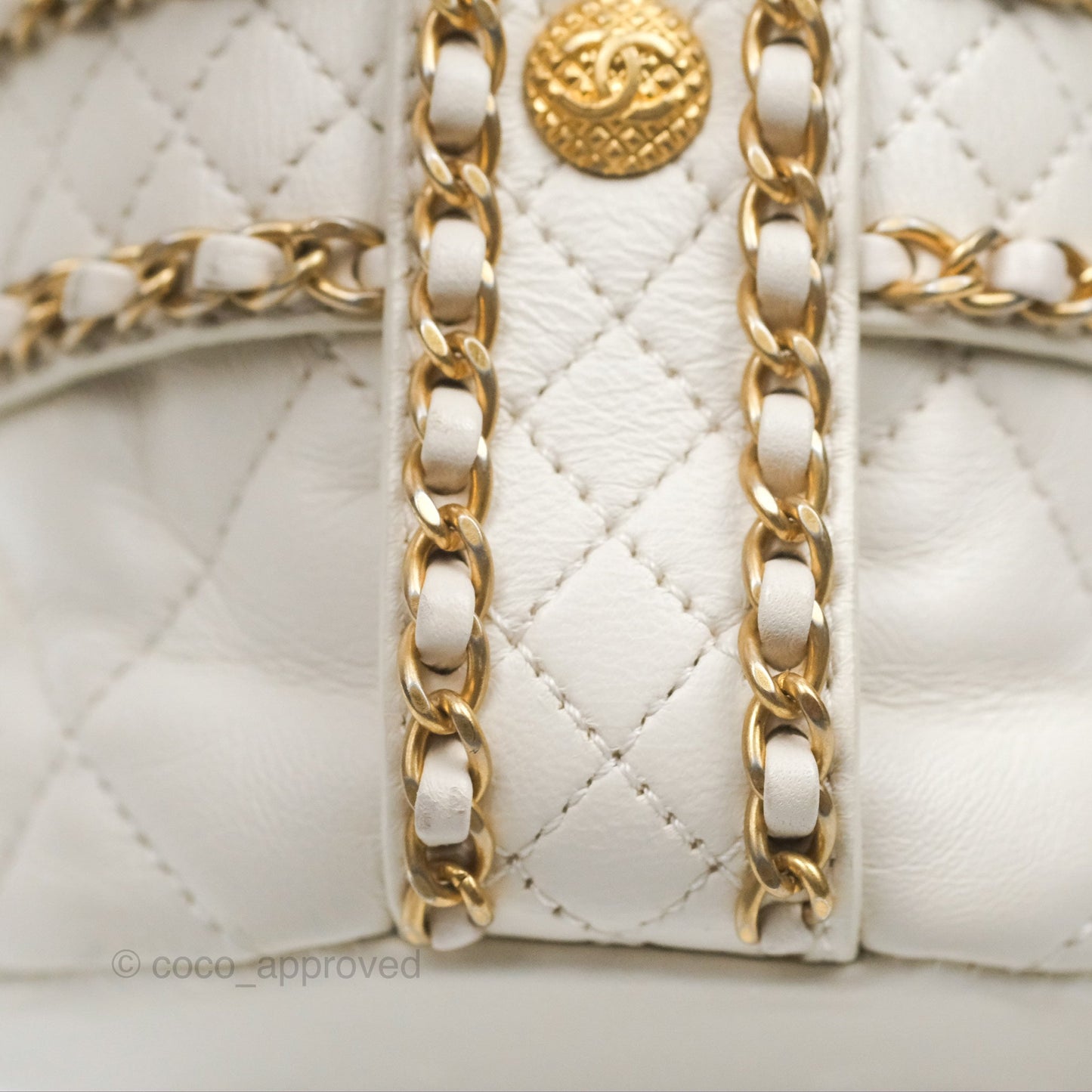 Chanel Quilted Drawstring Bucket Bag Ivory Lambskin Aged Gold Hardware