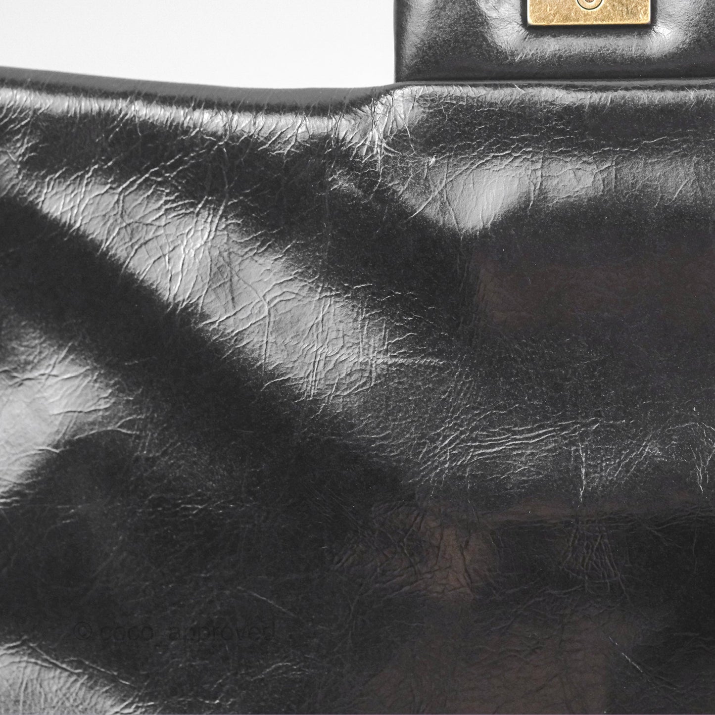 Chanel Medium Castle Rock Flap Black Glazed Calfskin Antique Gold Hardware