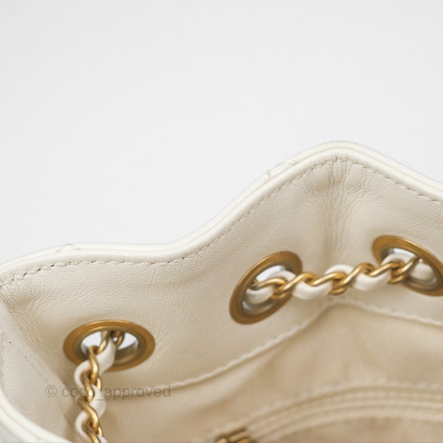 Chanel Quilted Drawstring Bucket Bag Ivory Lambskin Aged Gold Hardware