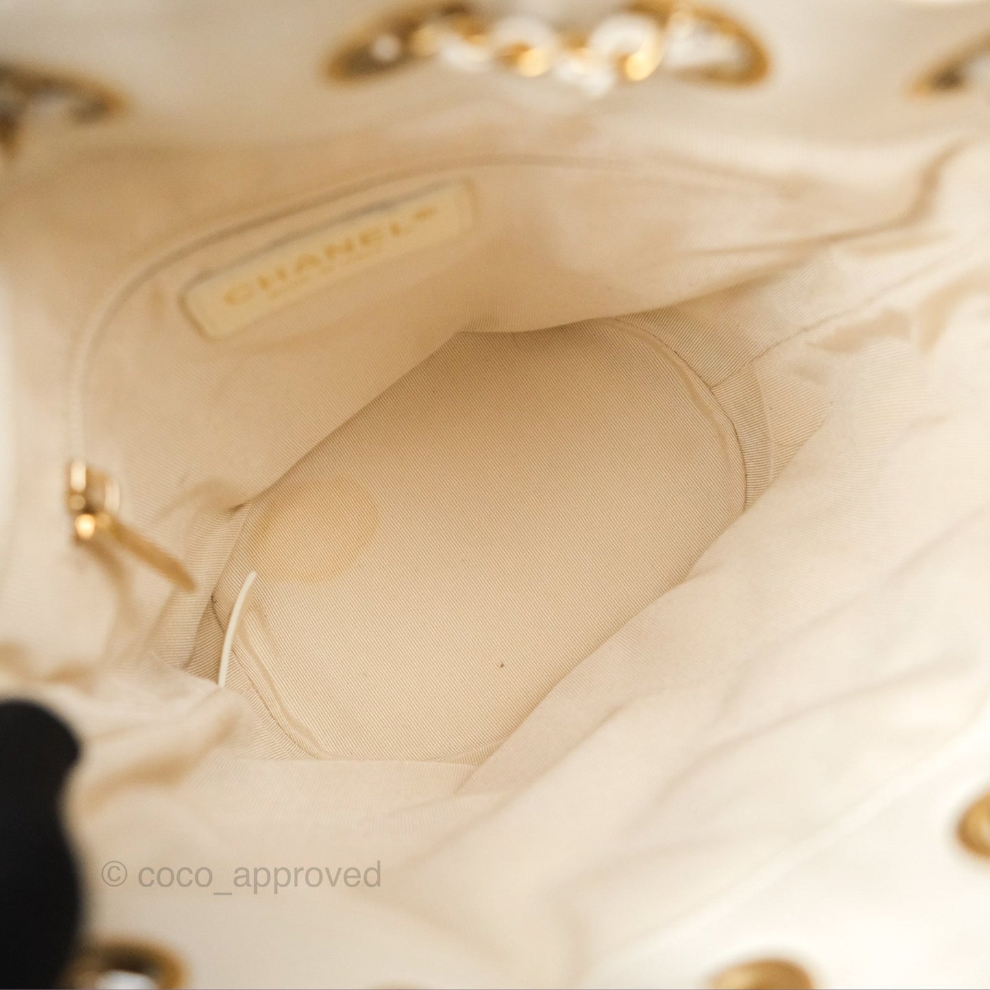 Chanel Quilted Drawstring Bucket Bag Ivory Lambskin Aged Gold Hardware