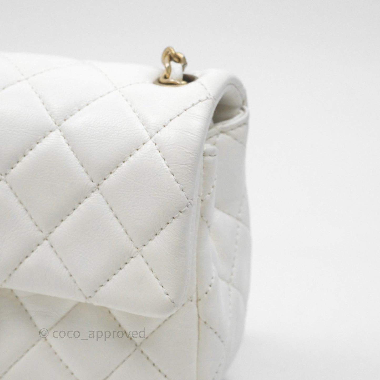 Chanel Mini Rectangular Pearl Crush Quilted White Lambskin Aged Gold Hardware