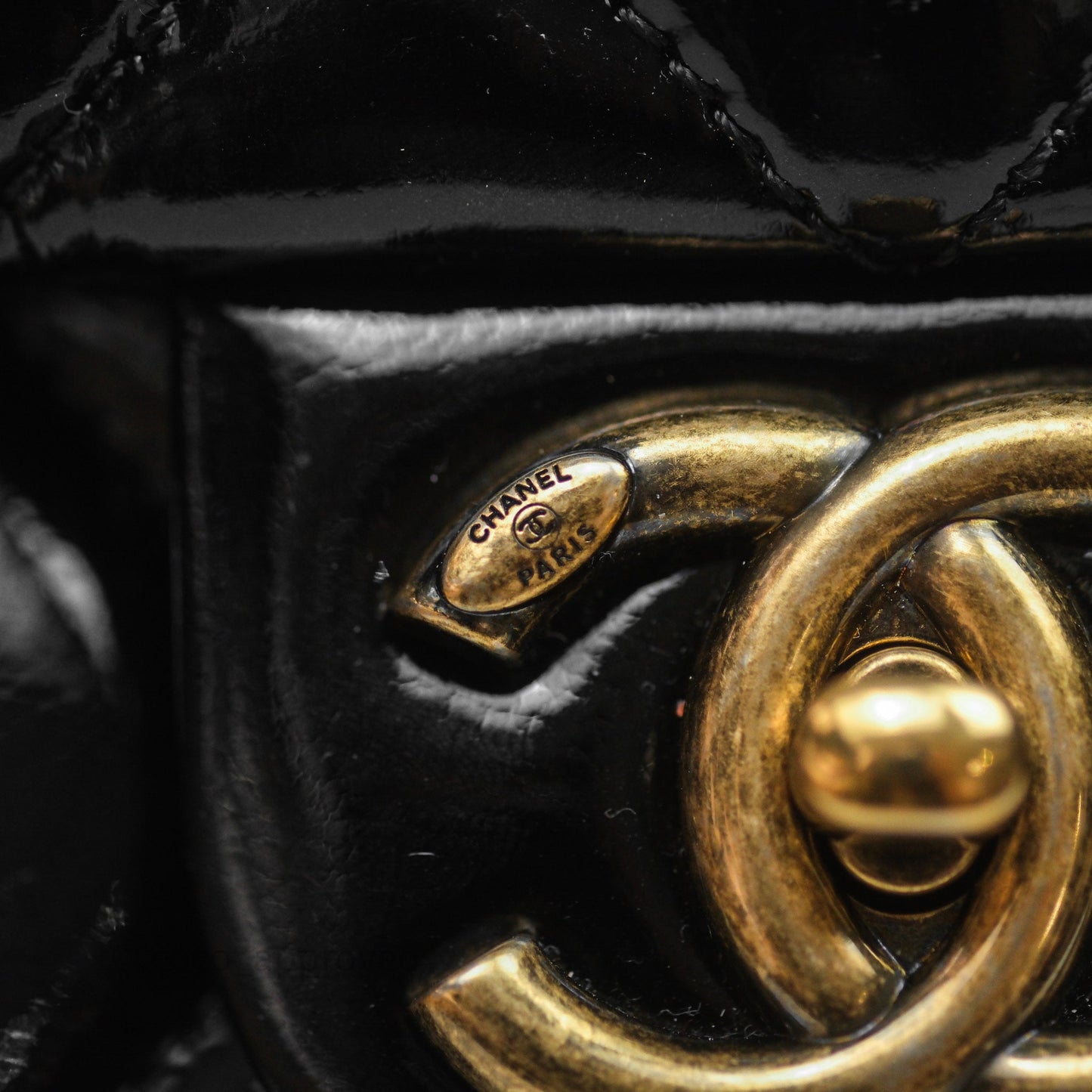 Chanel Quilted Medium Eyelet Flap Bag Black Patent Aged Gold Hardware