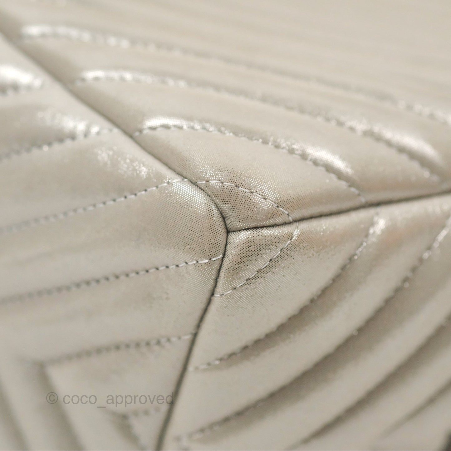 Chanel Small Urban Spirit Drawstring Bag Chevron Iridescent Silver Calfskin