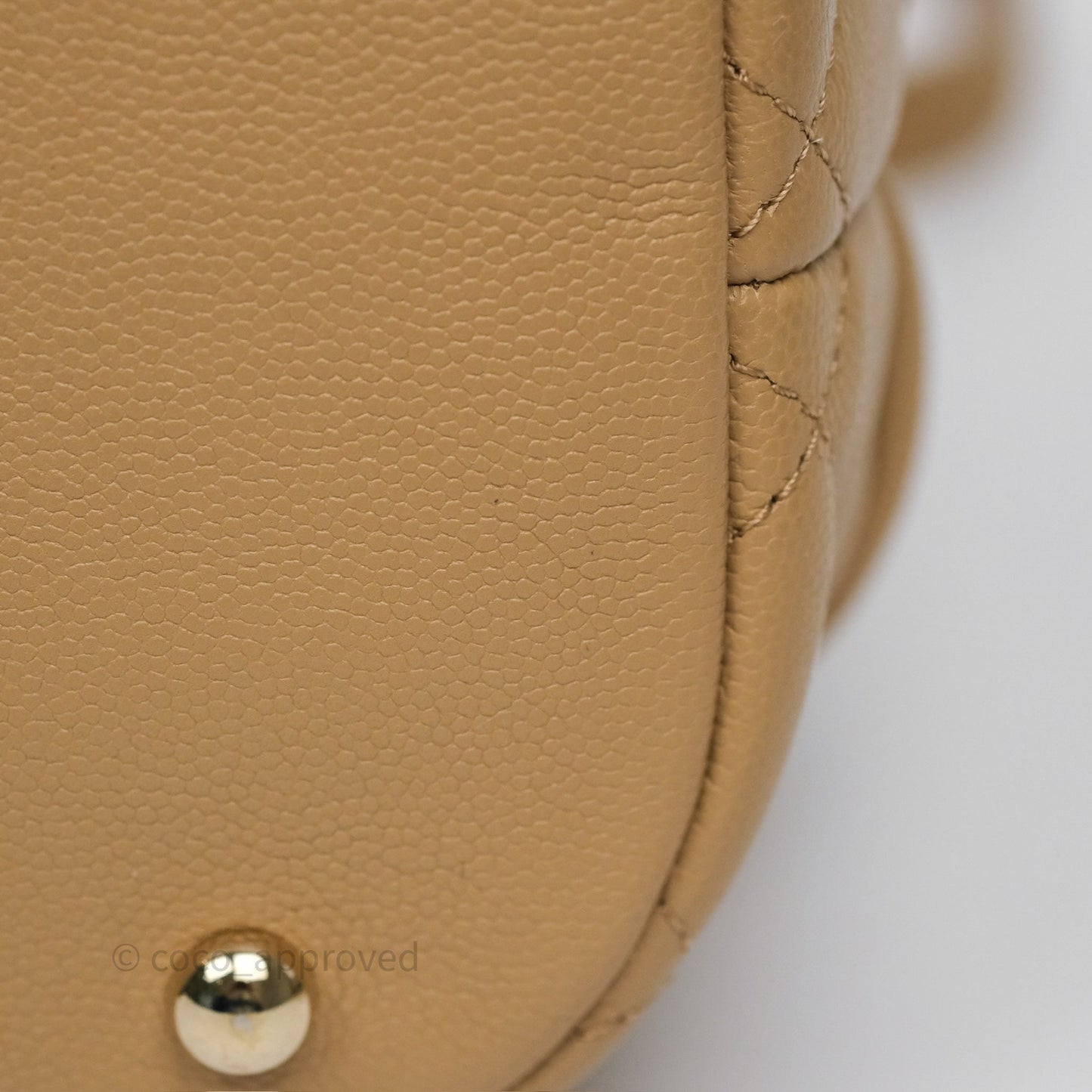 Chanel Rolled Up Bucket Drawstring Bag Beige Caviar Gold Hardware