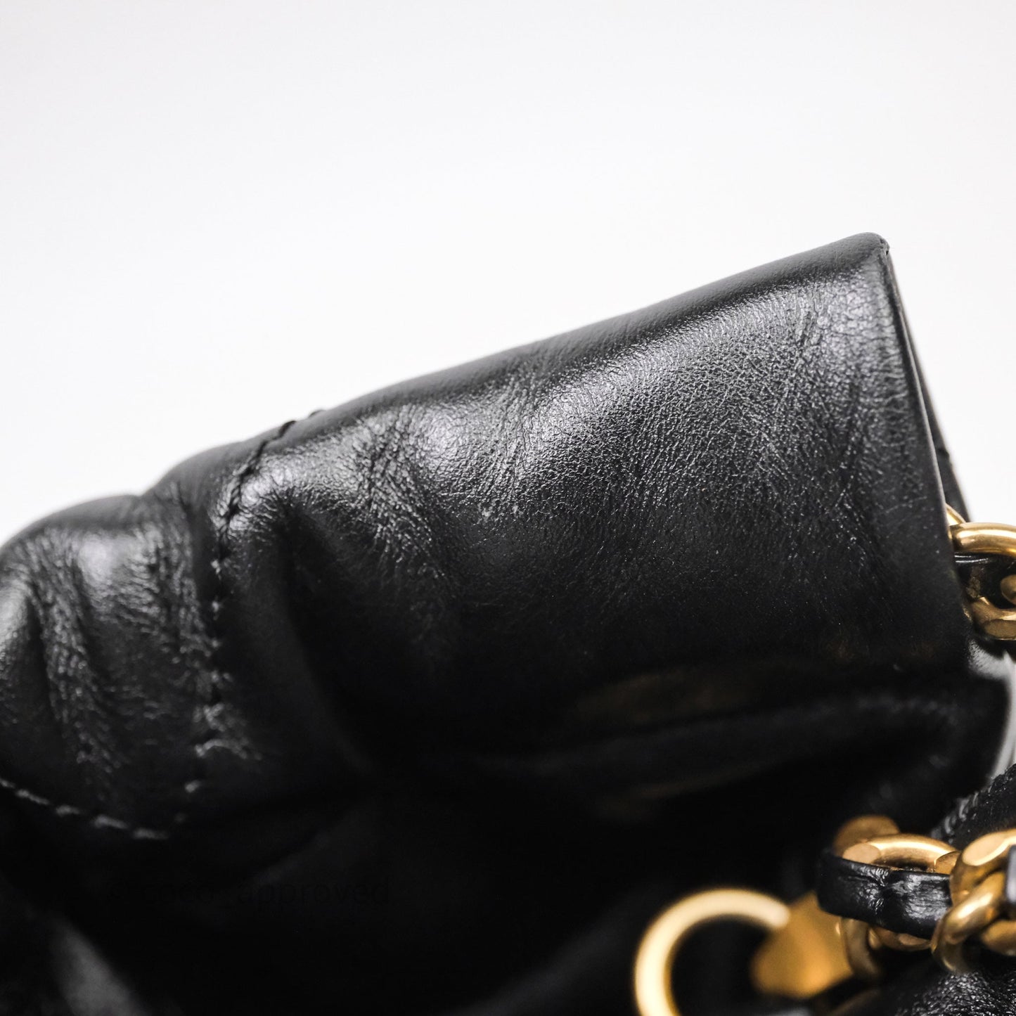 Chanel 22 Mini Bag Black Crumpled Calfskin White Lacquered Metal Logo