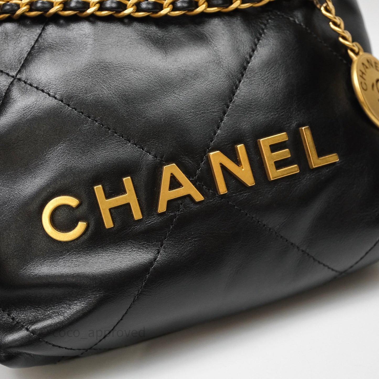 Chanel 22 Mini Bag Black Shiny Crumpled Calfskin Aged Gold Hardware