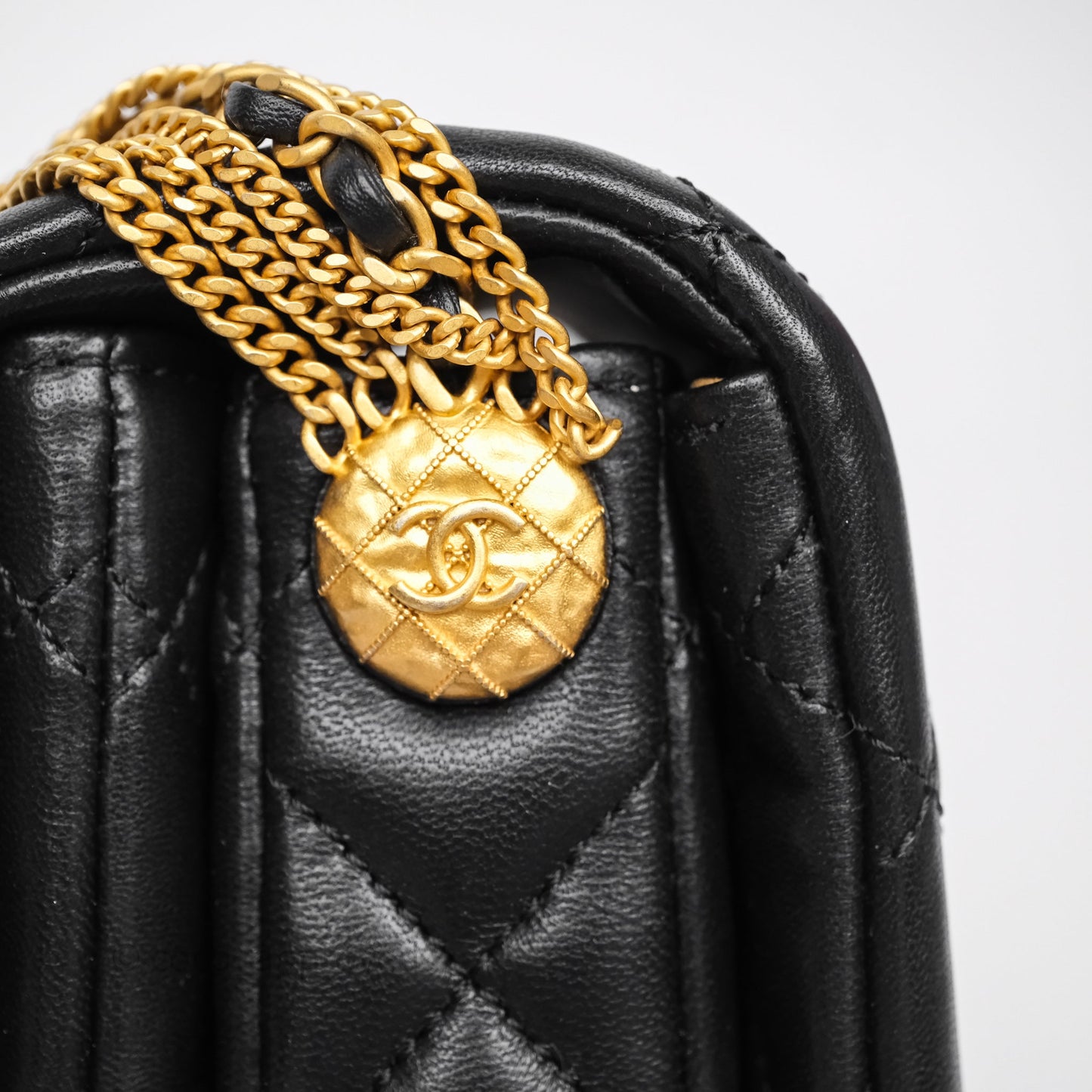 Chanel Quilted Accordion Flap Bag with Button on Chain Black Lambskin Aged Gold Hardware 22A