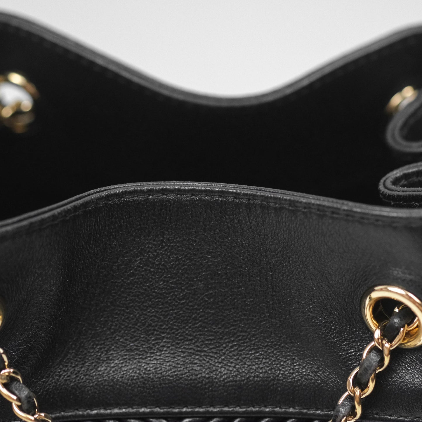 Chanel CC Chain Drawstring Bucket Bag Chevron Black Lambskin Gold Hardware