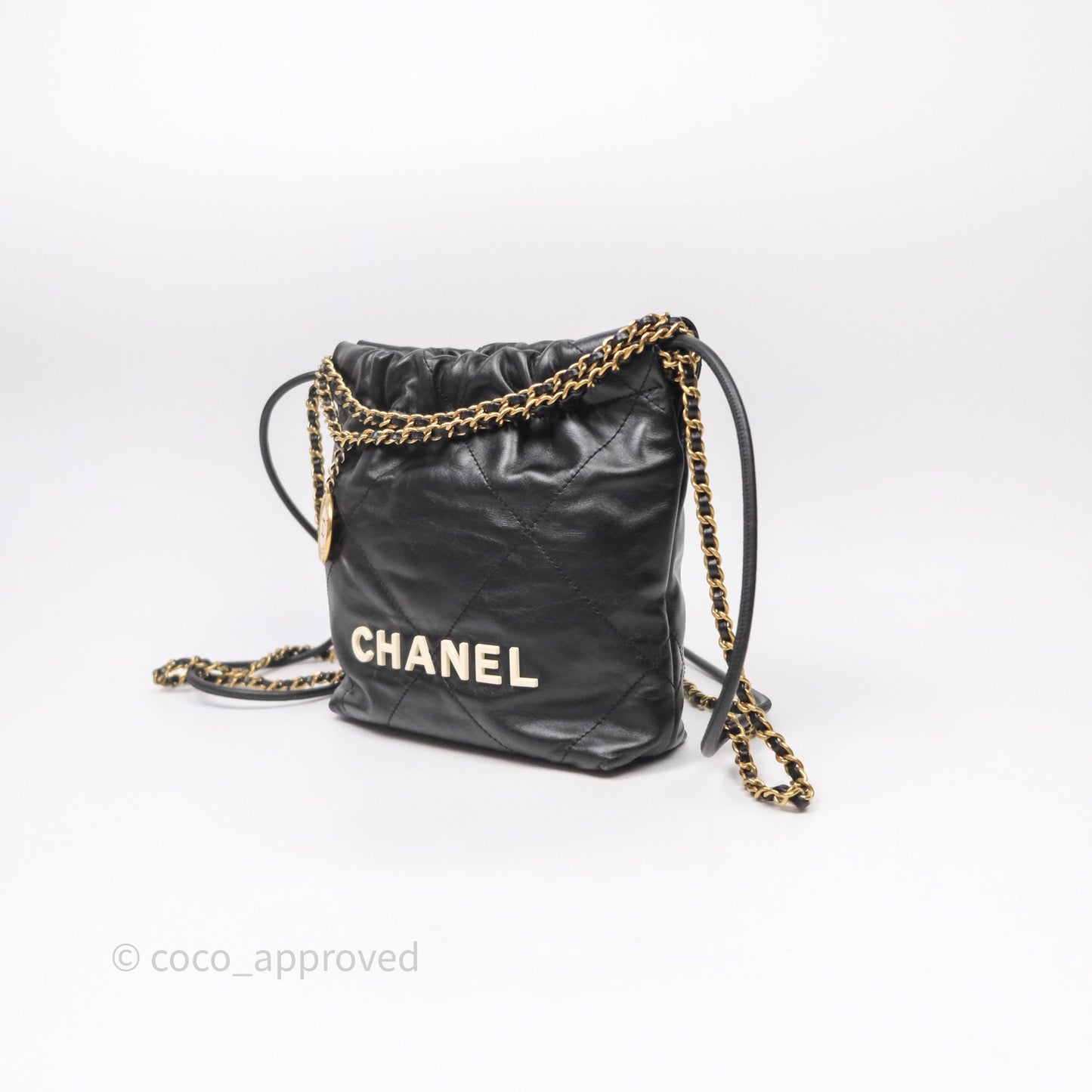 Chanel 22 Mini Bag Black Crumpled Calfskin White Lacquered Metal Logo