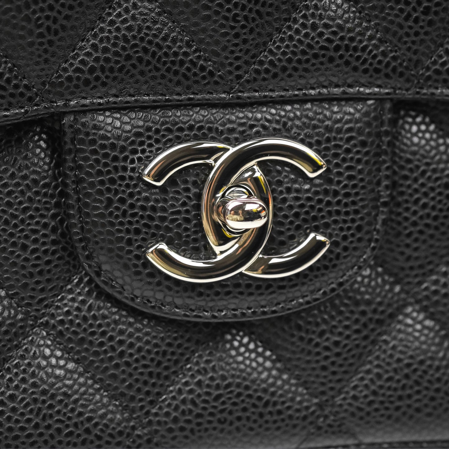 Chanel Quilted Maxi Double Flap Black Caviar Silver Hardware