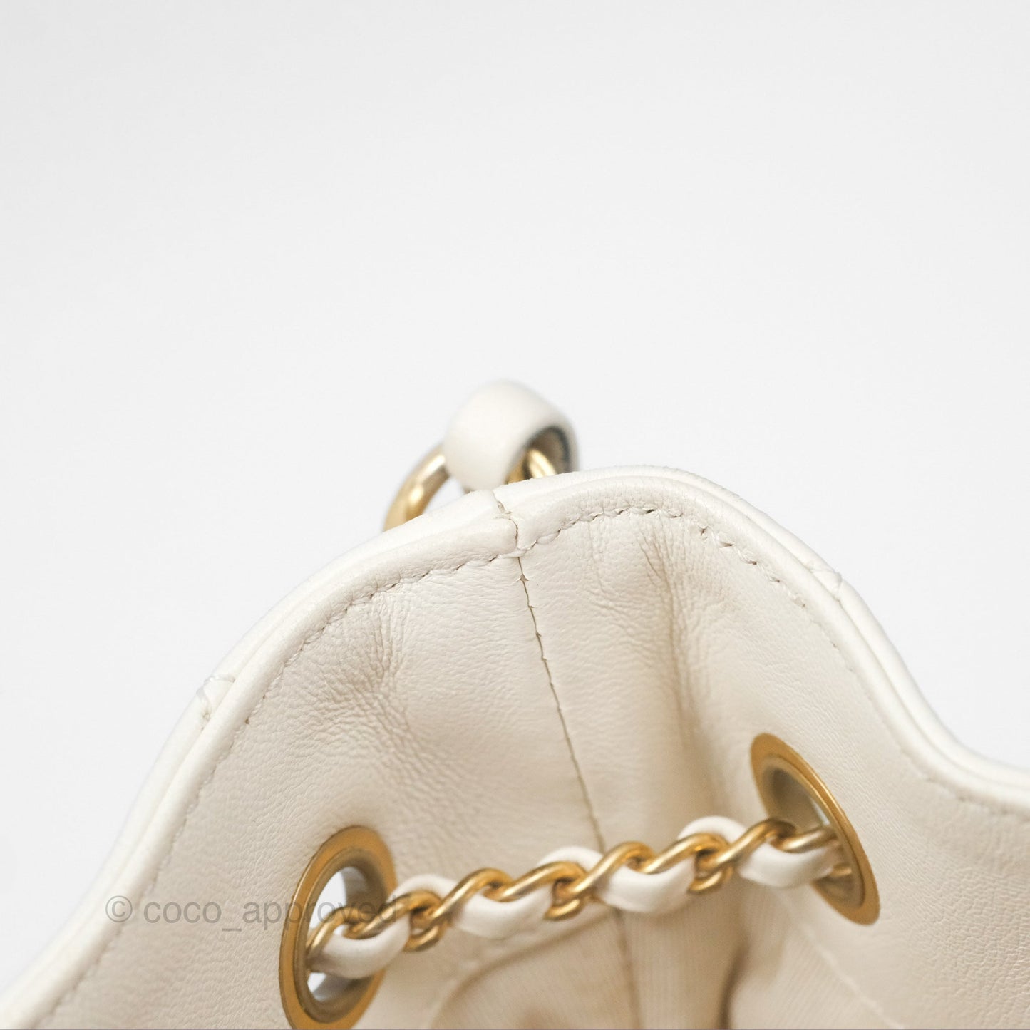 Chanel Quilted Drawstring Bucket Bag Ivory Lambskin Aged Gold Hardware