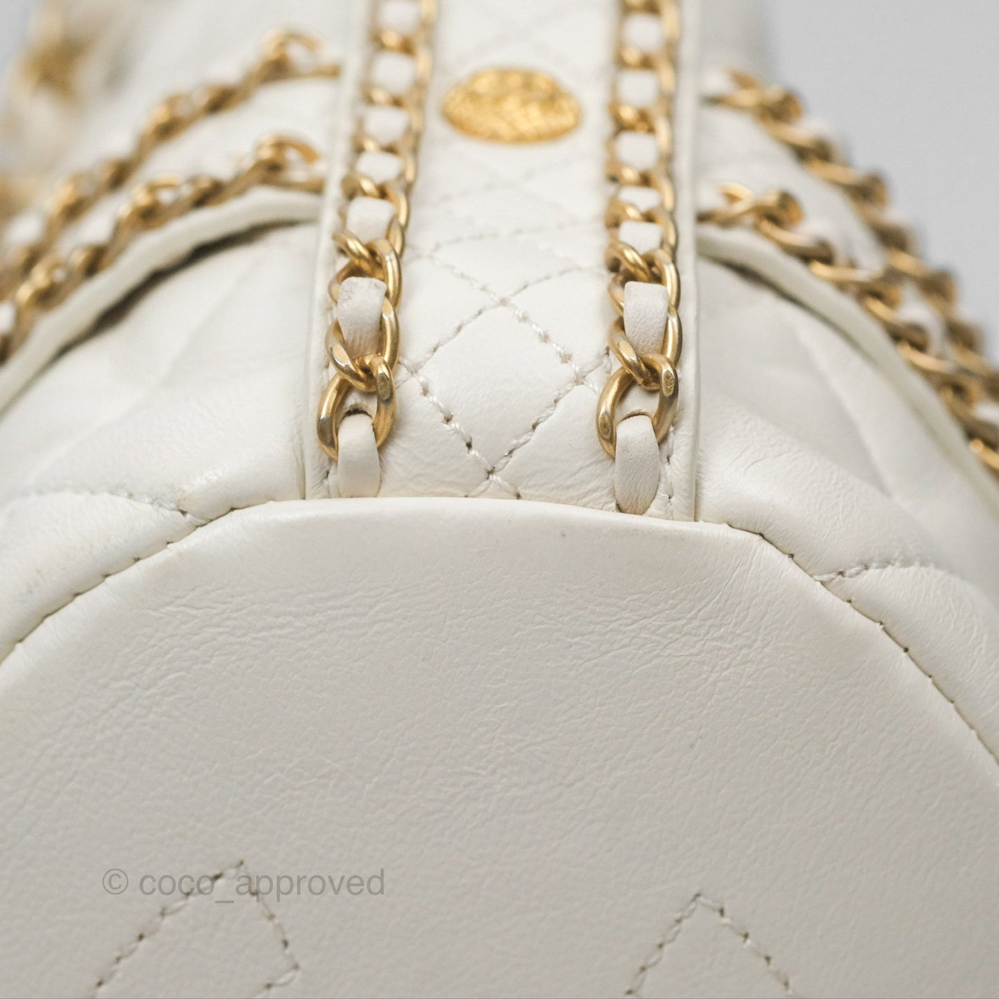 Chanel Quilted Drawstring Bucket Bag Ivory Lambskin Aged Gold Hardware