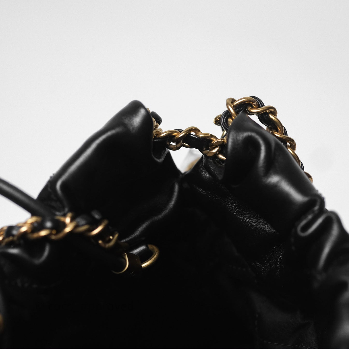 Chanel 22 Mini Bag Black Crumpled Calfskin Aged Gold Hardware