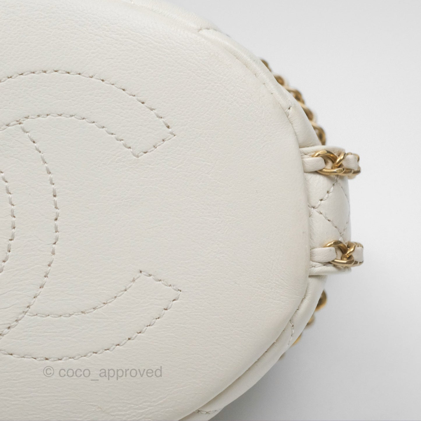 Chanel Quilted Drawstring Bucket Bag Ivory Lambskin Aged Gold Hardware