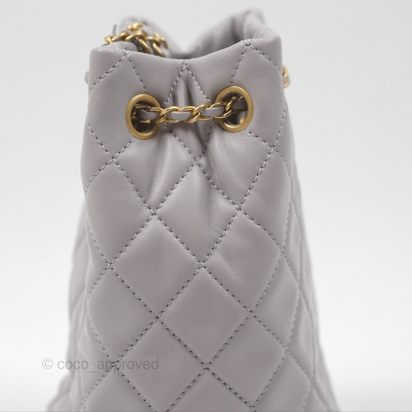 Chanel Pearl Crush Drawstring Bucket Bag Grey Lambskin Aged Gold Hardware