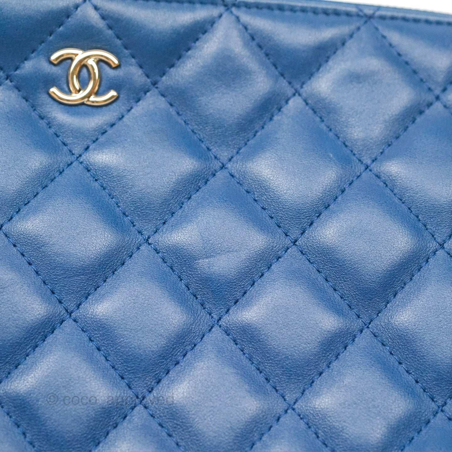 Chanel Medium Quilted O Case Blue Lambskin Gold Hardware