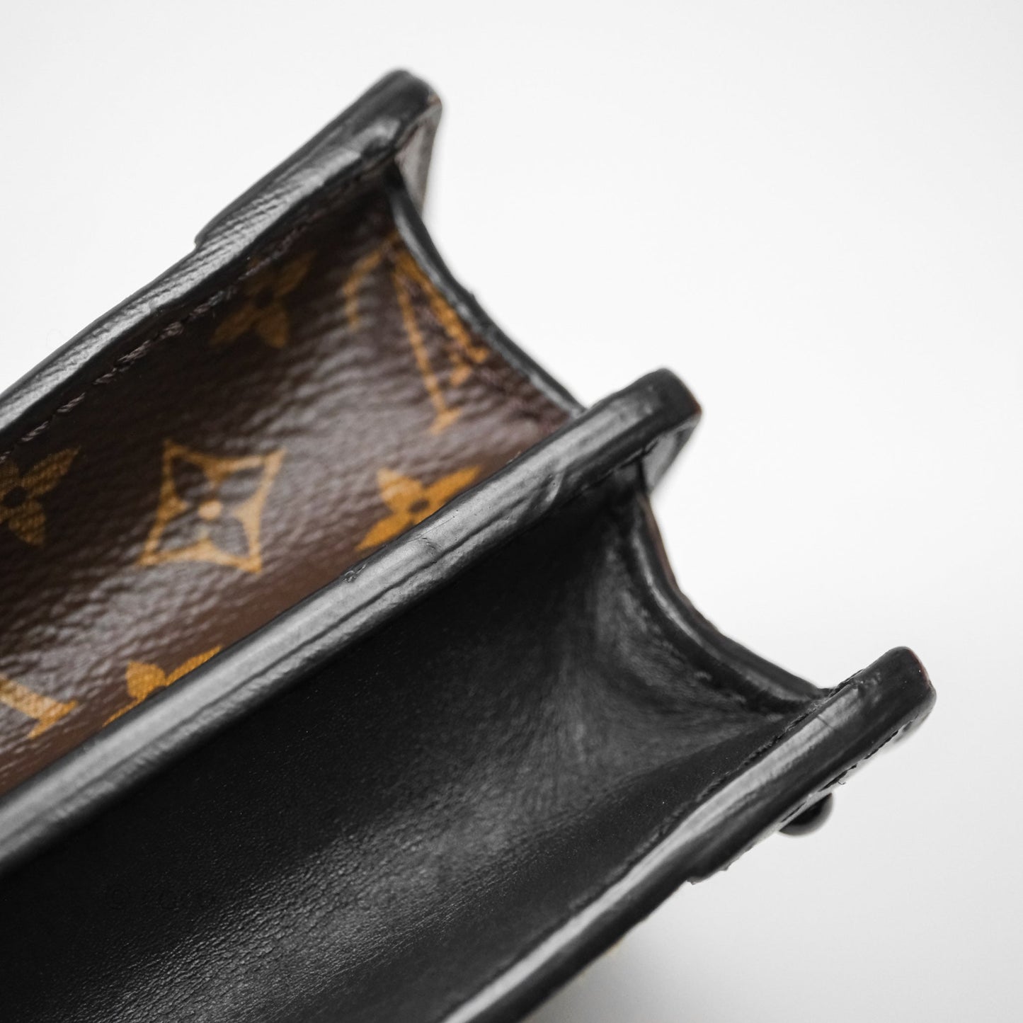 Louis Vuitton Monogram Reverse Trunk Clutch Bag