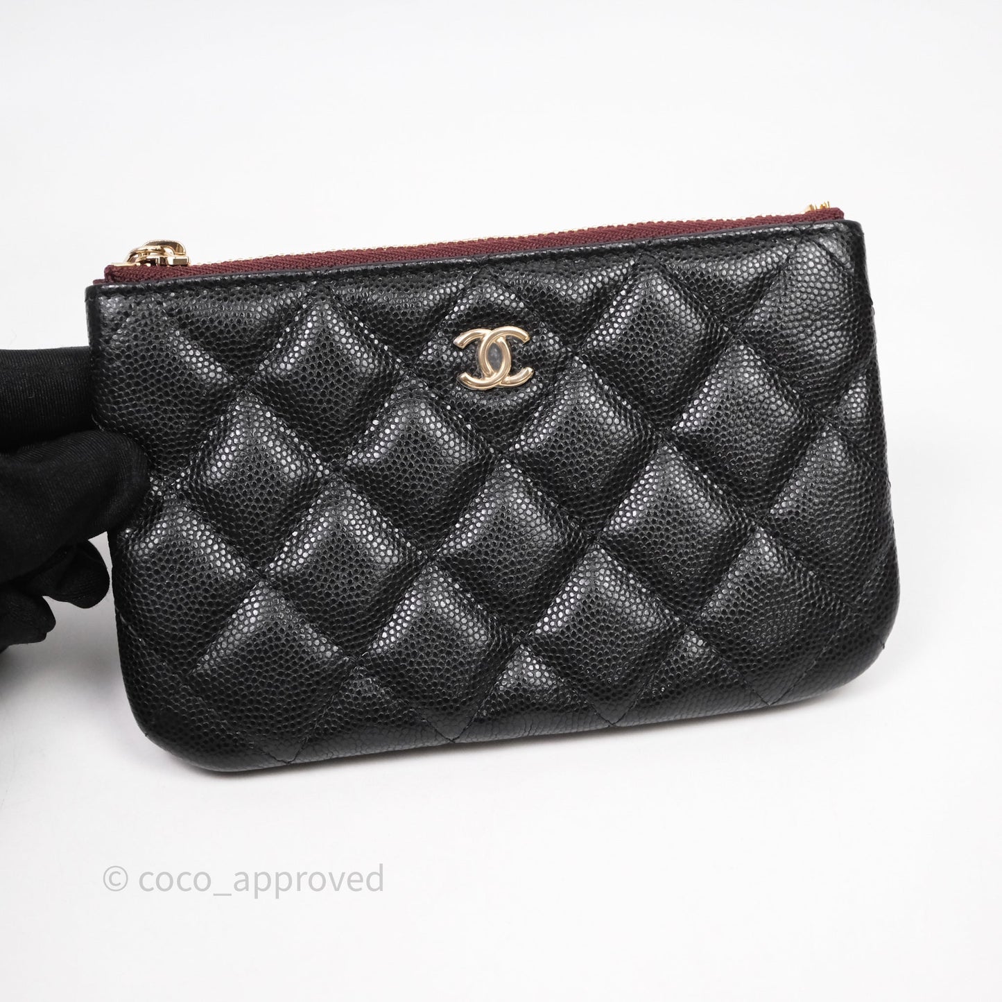Chanel Quilted Mini O case Black Caviar Gold Hardware