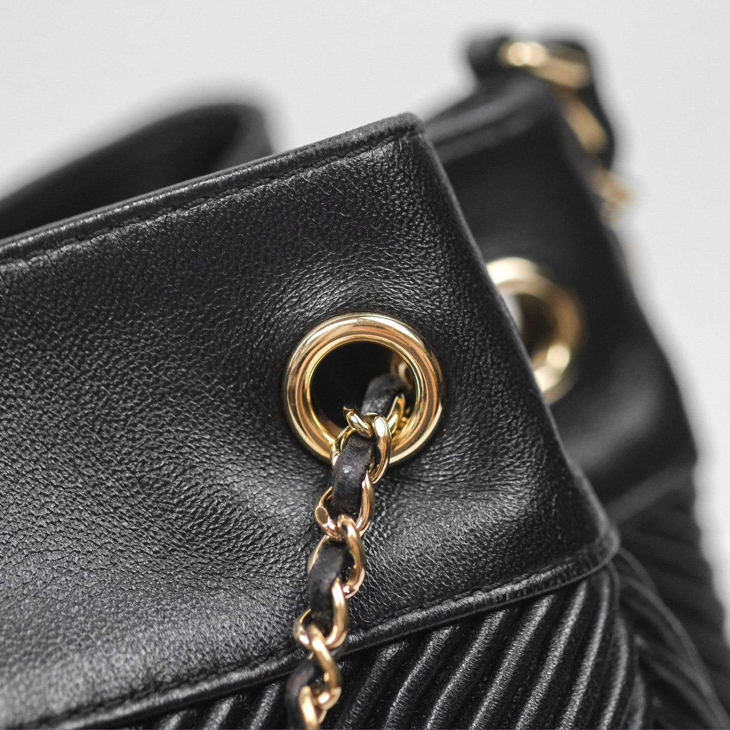 Chanel CC Chain Drawstring Bucket Bag Chevron Black Lambskin Gold Hardware