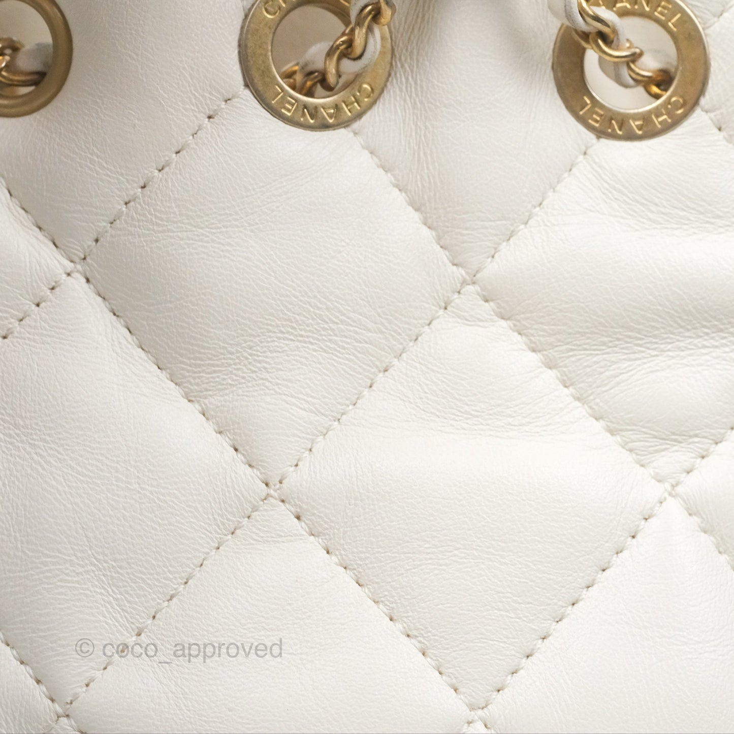 Chanel Quilted Drawstring Bucket Bag Ivory Lambskin Aged Gold Hardware