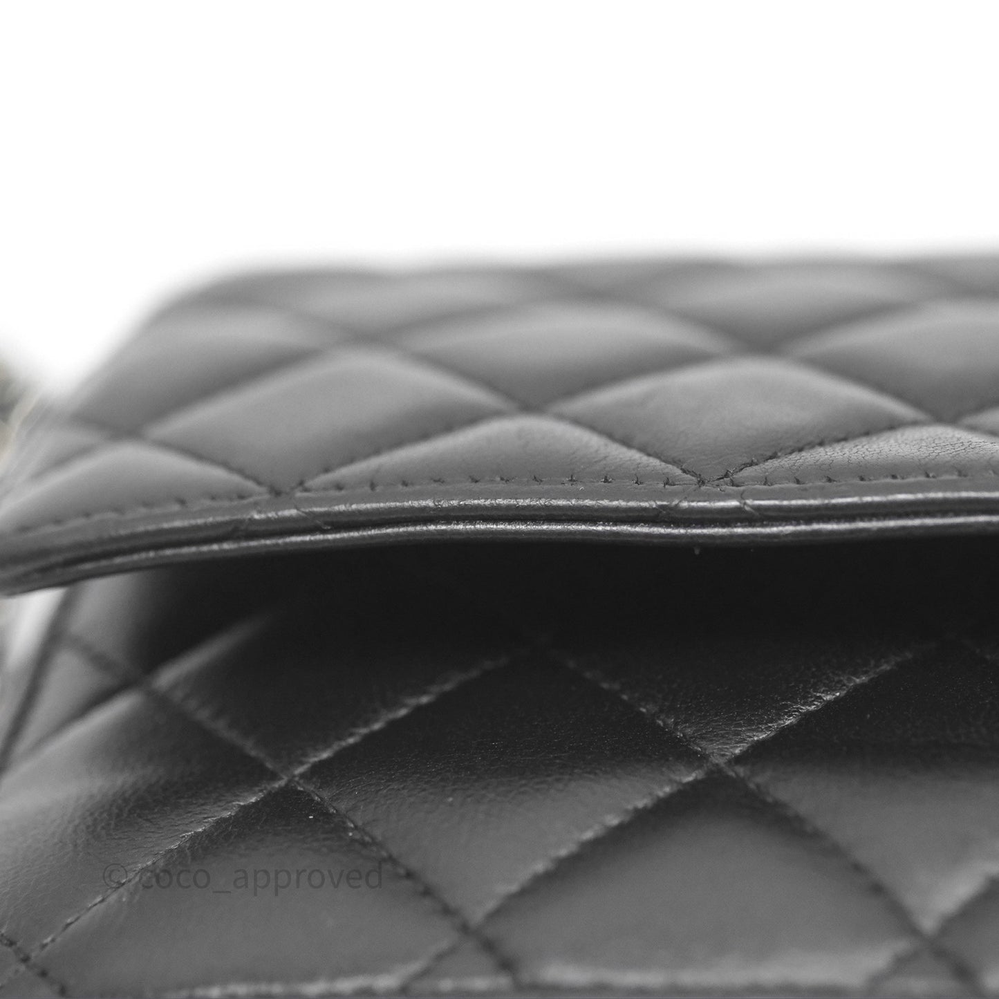 Chanel Quilted WOC Black Lambskin Silver Hardware