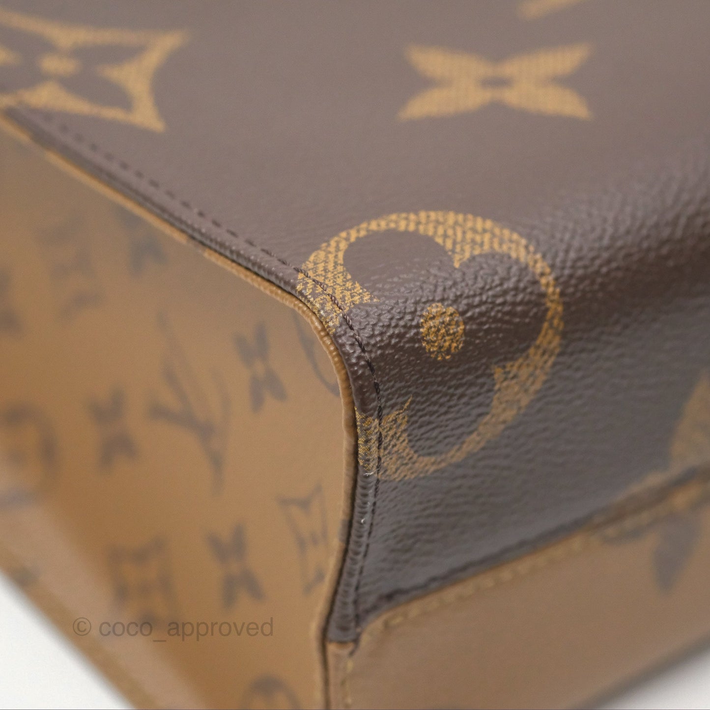 Louis Vuitton OnTheGo PM in Monogram Reverse Canvas