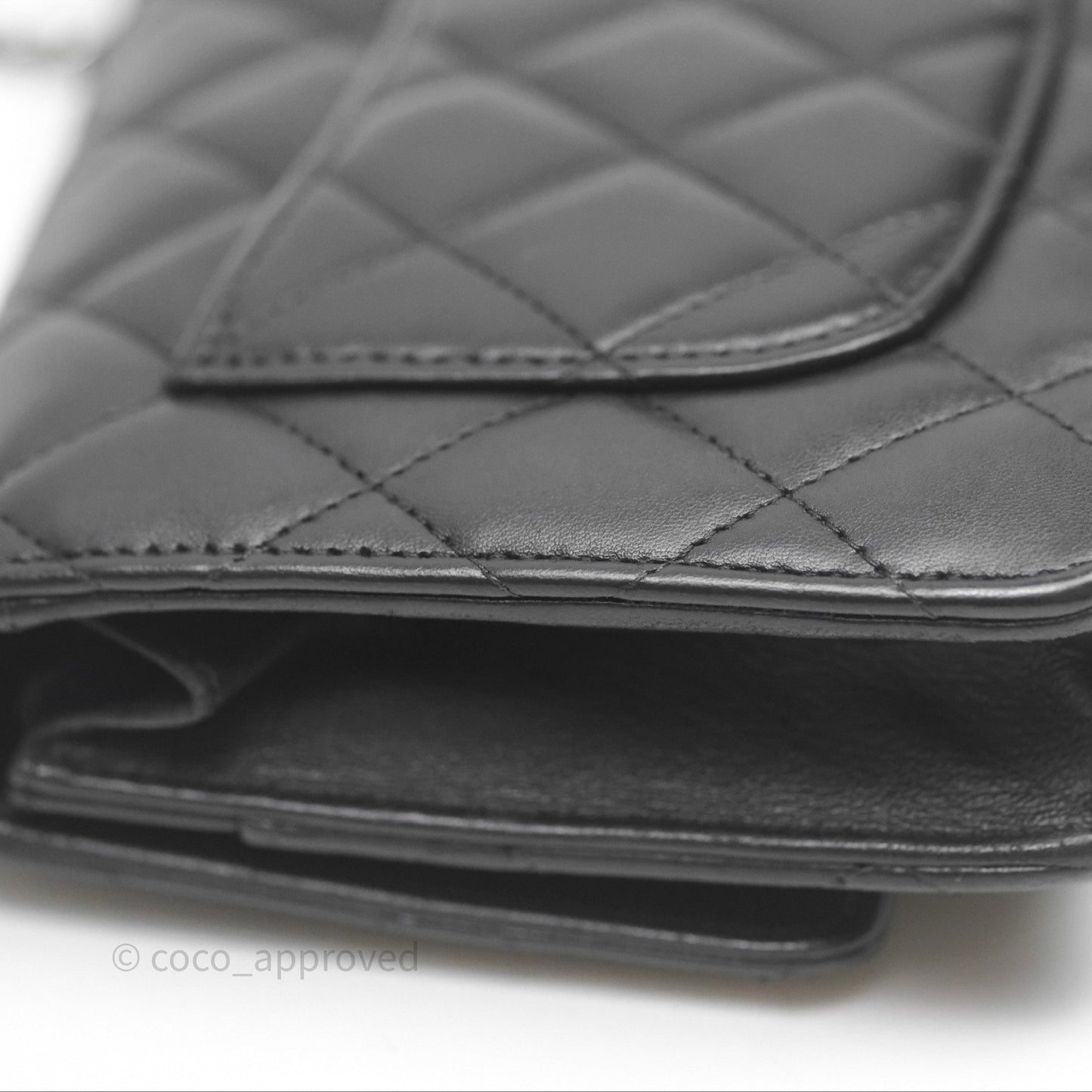 Chanel Quilted WOC Black Lambskin Silver Hardware