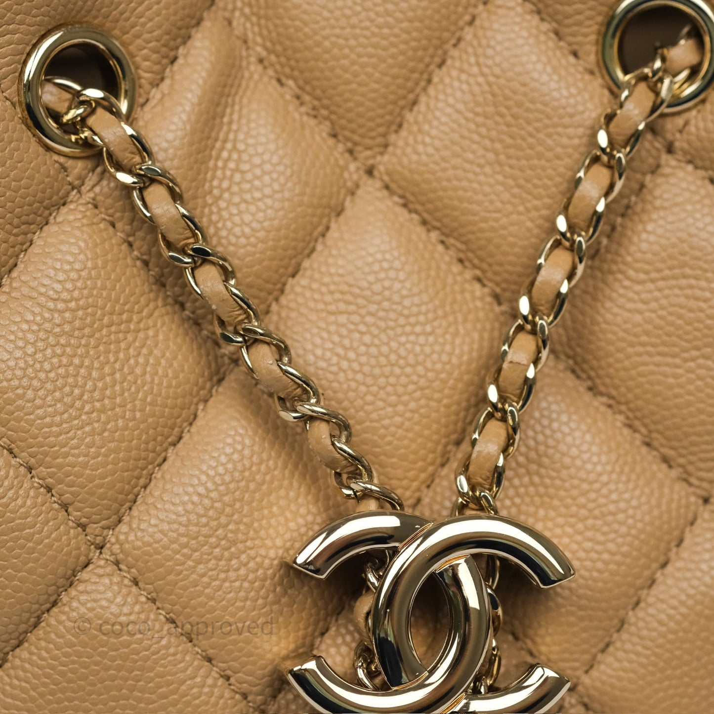 Chanel Rolled Up Bucket Drawstring Bag Beige Caviar Gold Hardware