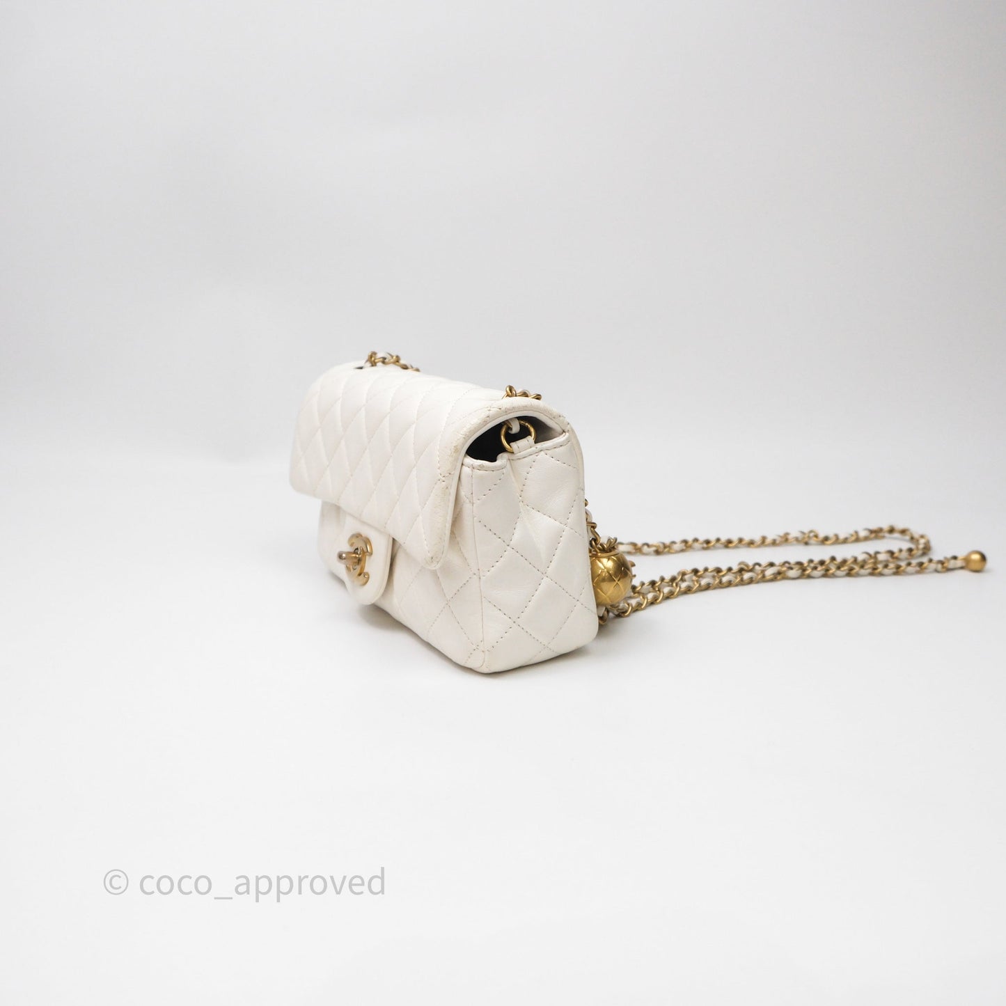 Chanel Mini Rectangular Pearl Crush Quilted White Lambskin Aged Gold Hardware