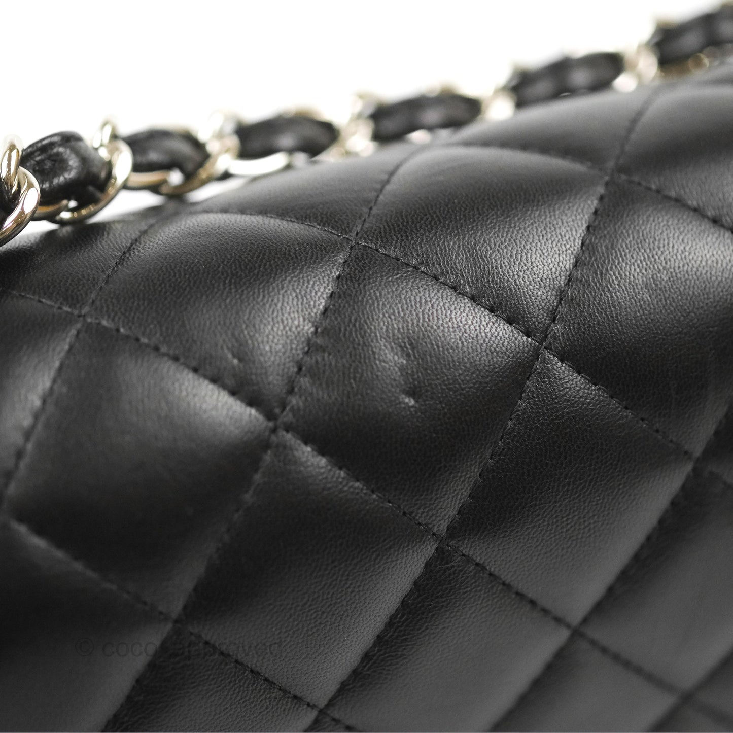 Chanel Quilted Maxi Double Flap Black Lambskin Silver Hardware
