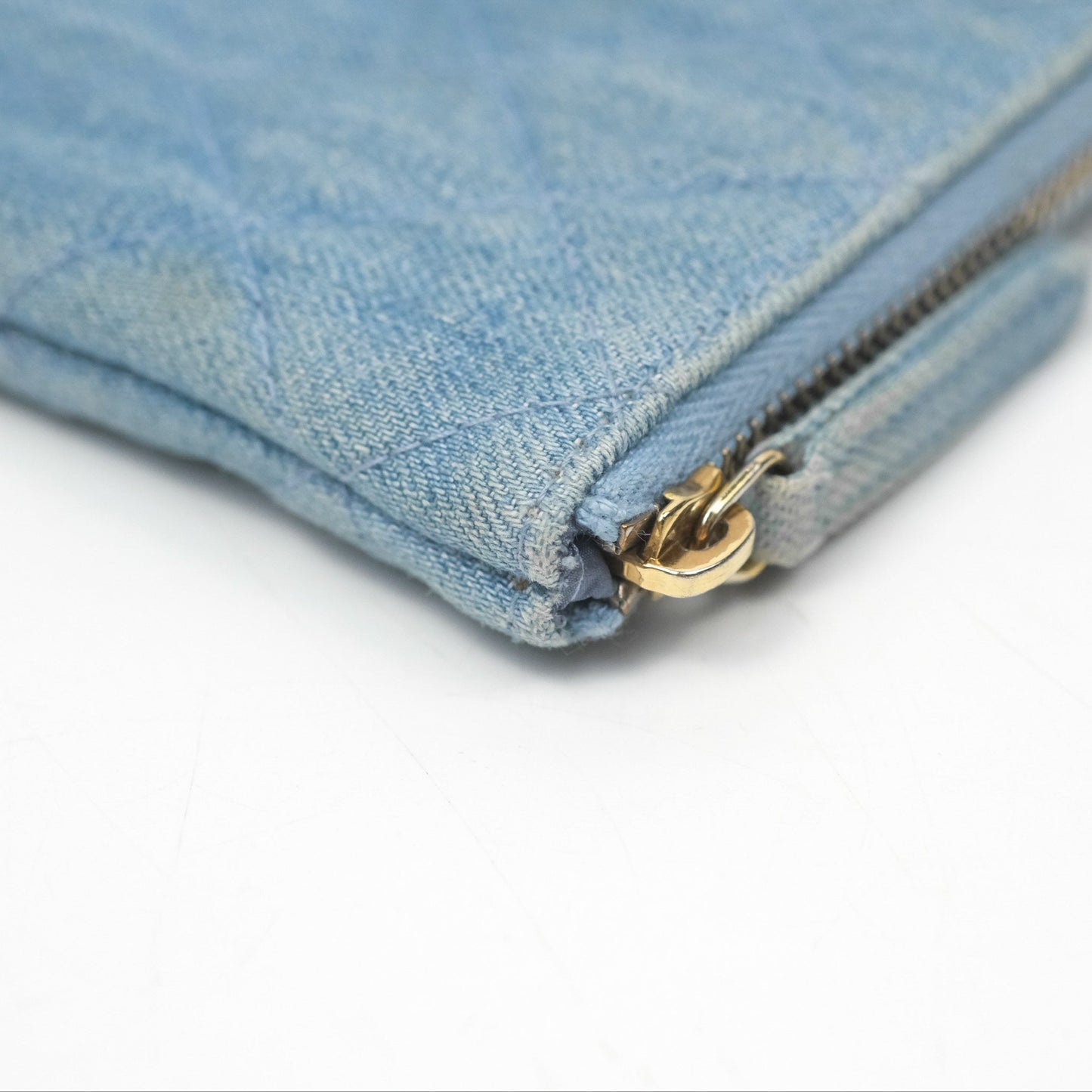 Chanel Mini Reissue O Case Quilted Light Blue Denim Aged Gold Hardware