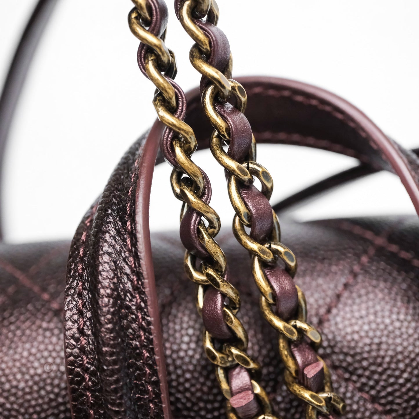 Chanel Quilted Filigree Backpack Iridescent Burgundy Caviar Aged Gold Hardware
