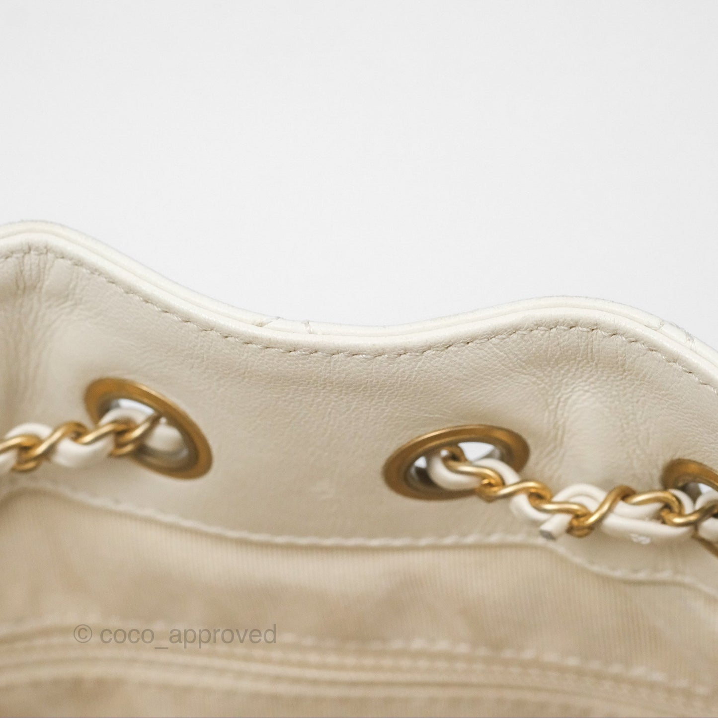 Chanel Quilted Drawstring Bucket Bag Ivory Lambskin Aged Gold Hardware