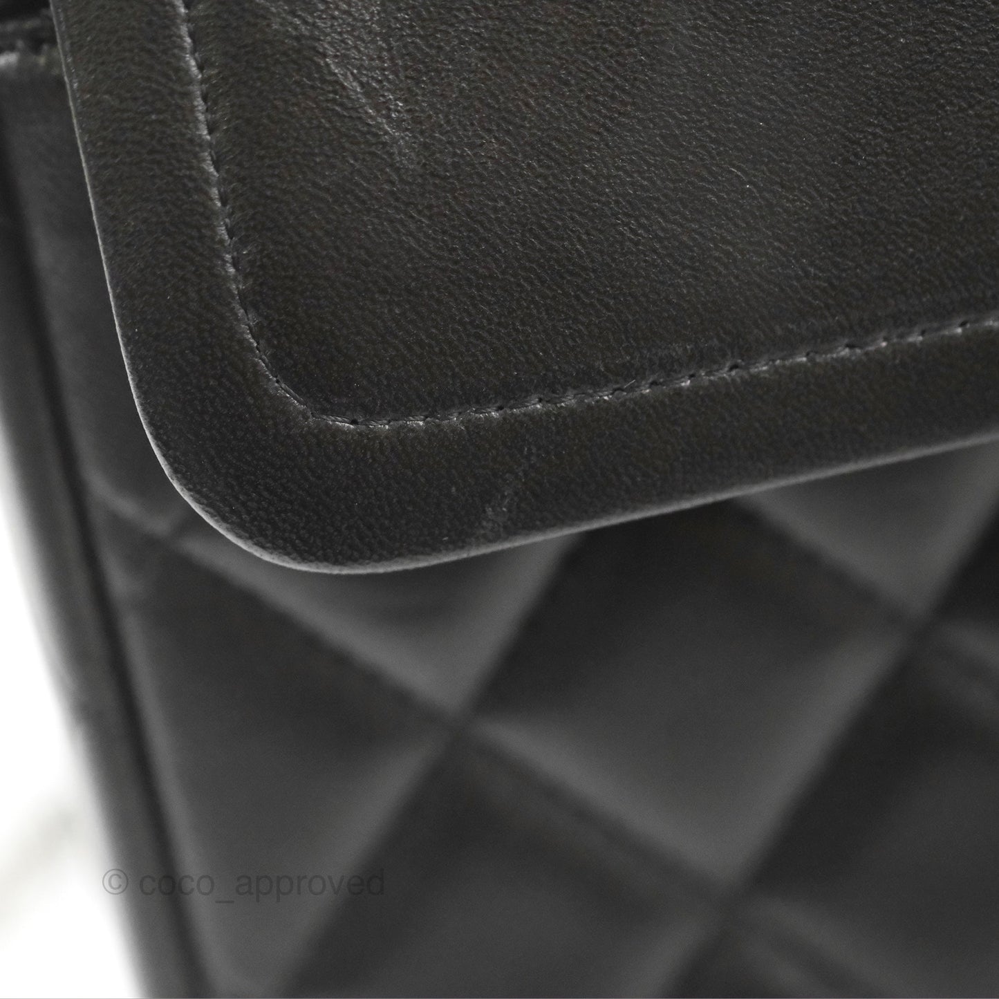 Chanel Quilted Maxi Double Flap Black Lambskin Silver Hardware