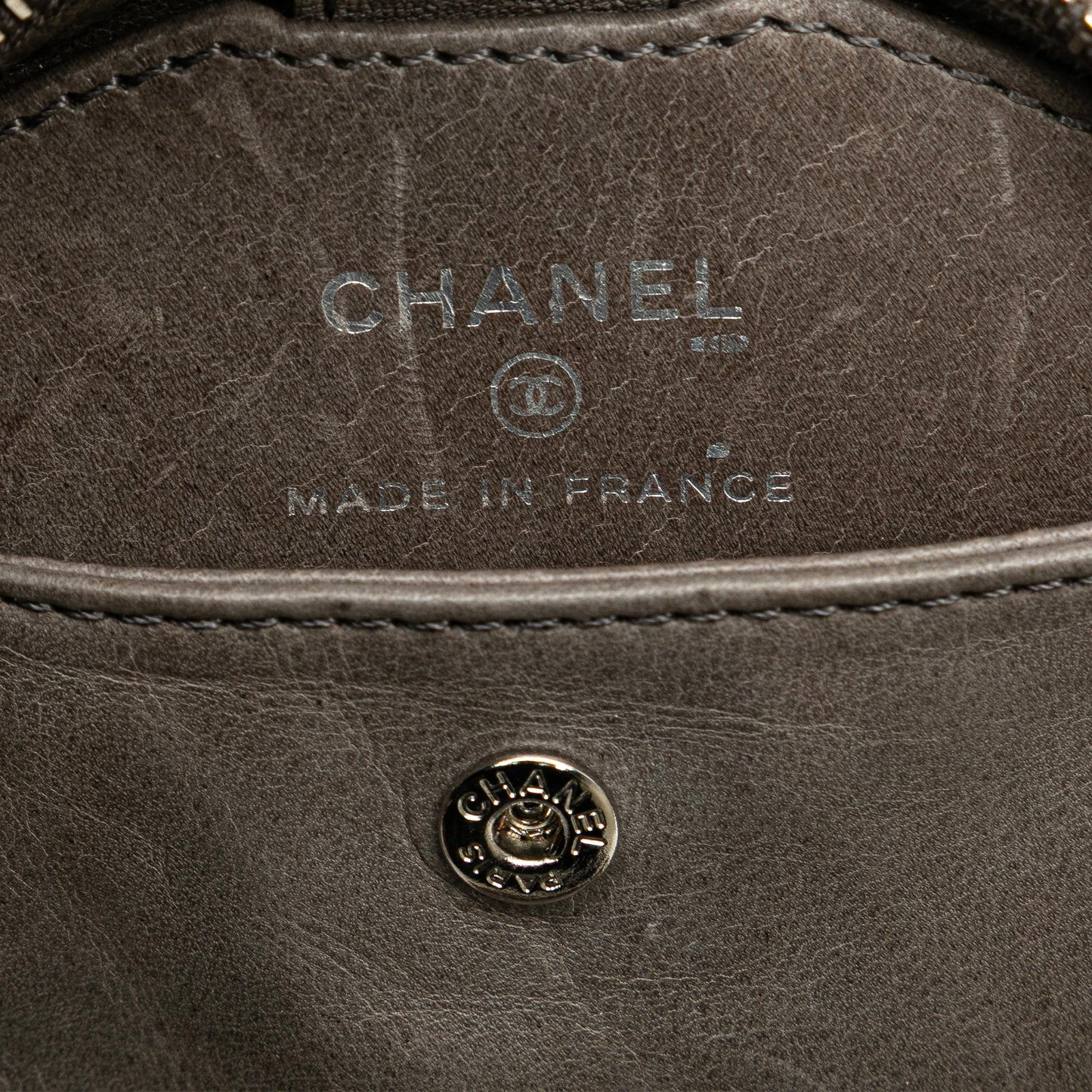 Chanel CC Quilted Aged Calfskin Round Clutch