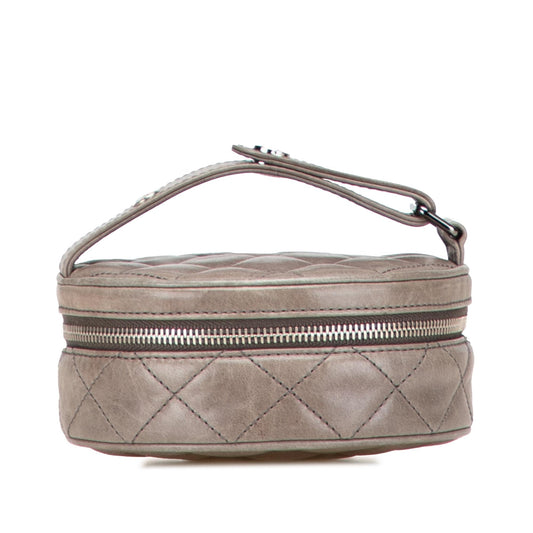 Chanel CC Quilted Aged Calfskin Round Clutch
