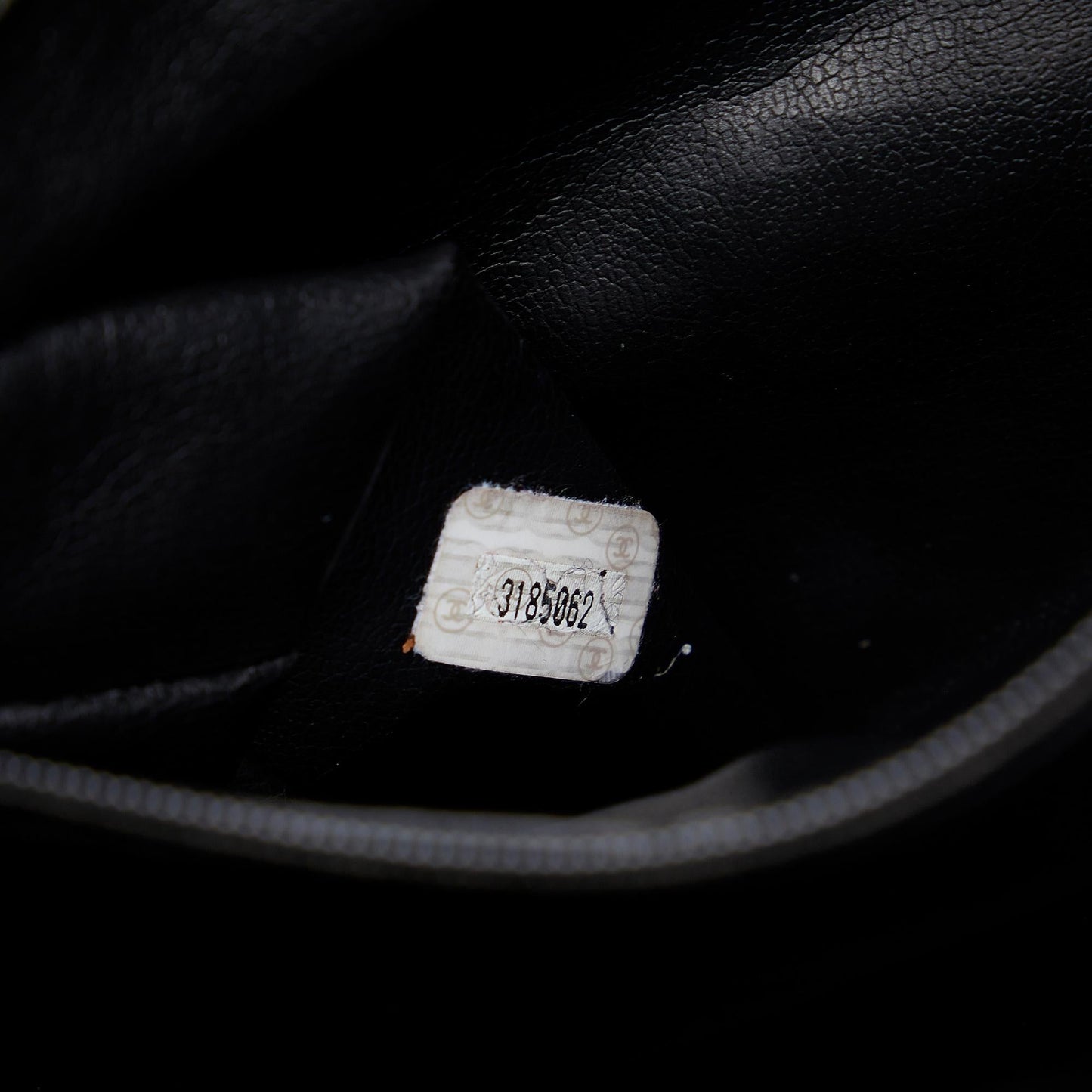 Chanel CC Quilted Lambskin Drawstring Backpack (SHG-86DOIB)