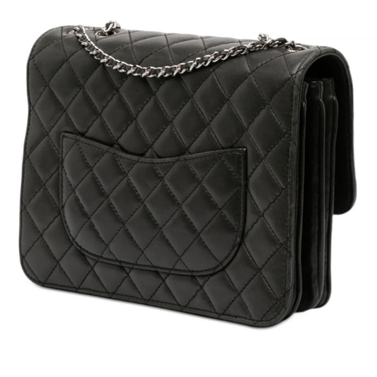 Chanel Medium Quilted Lambskin Clams Pocket Flap