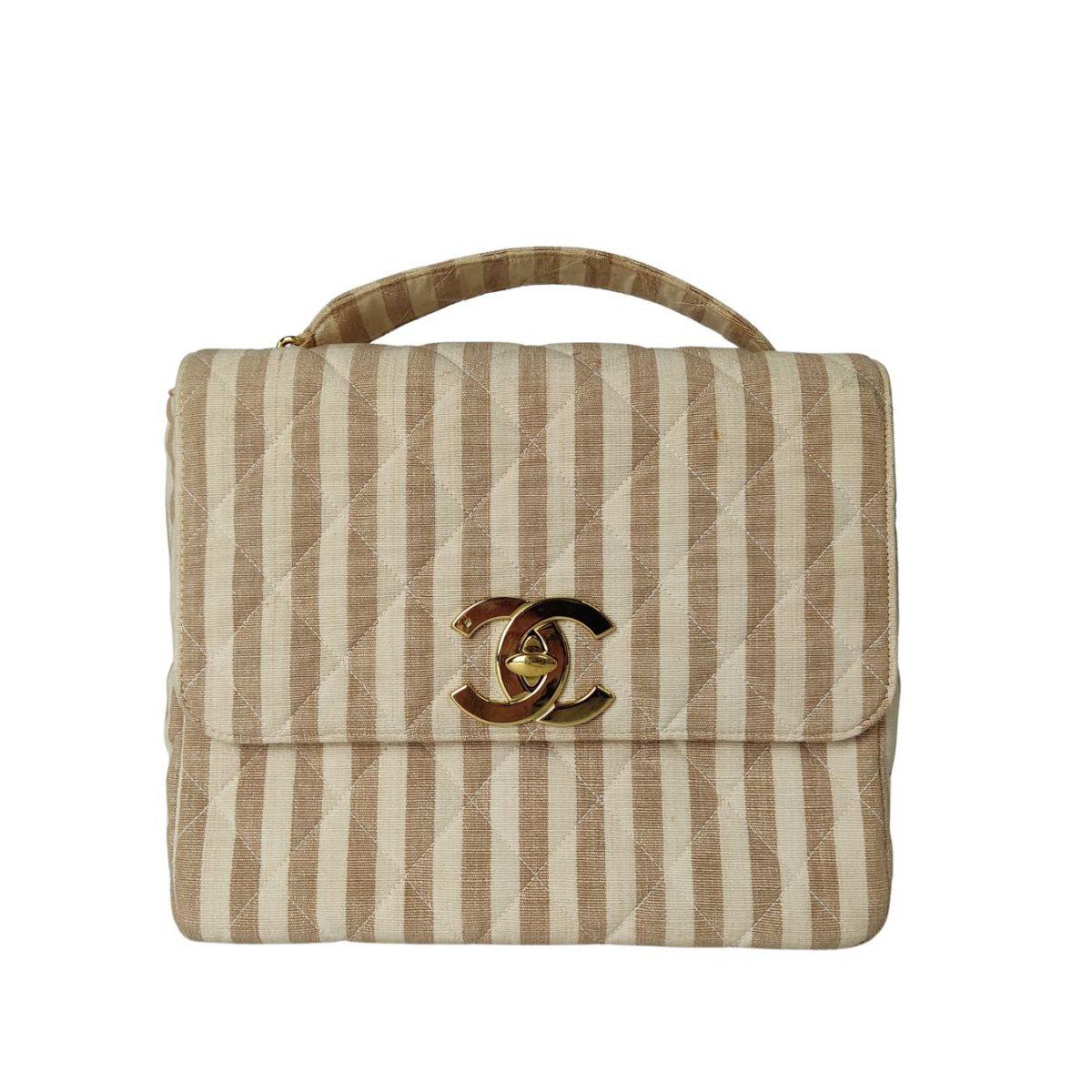 Luxury Chanel vintage handbag in striped cotton