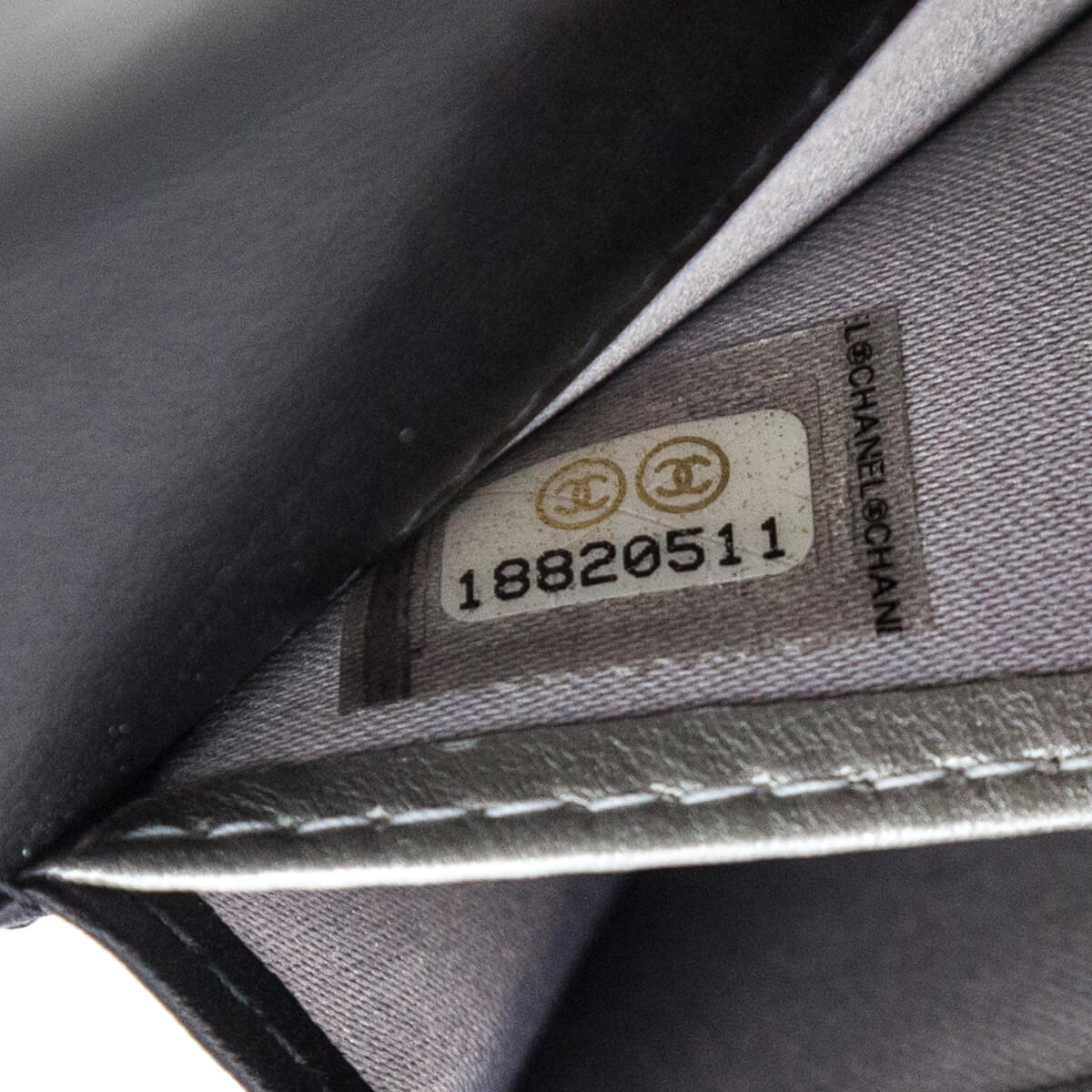 Chanel Black Camellia Embossed Long Flap Wallet