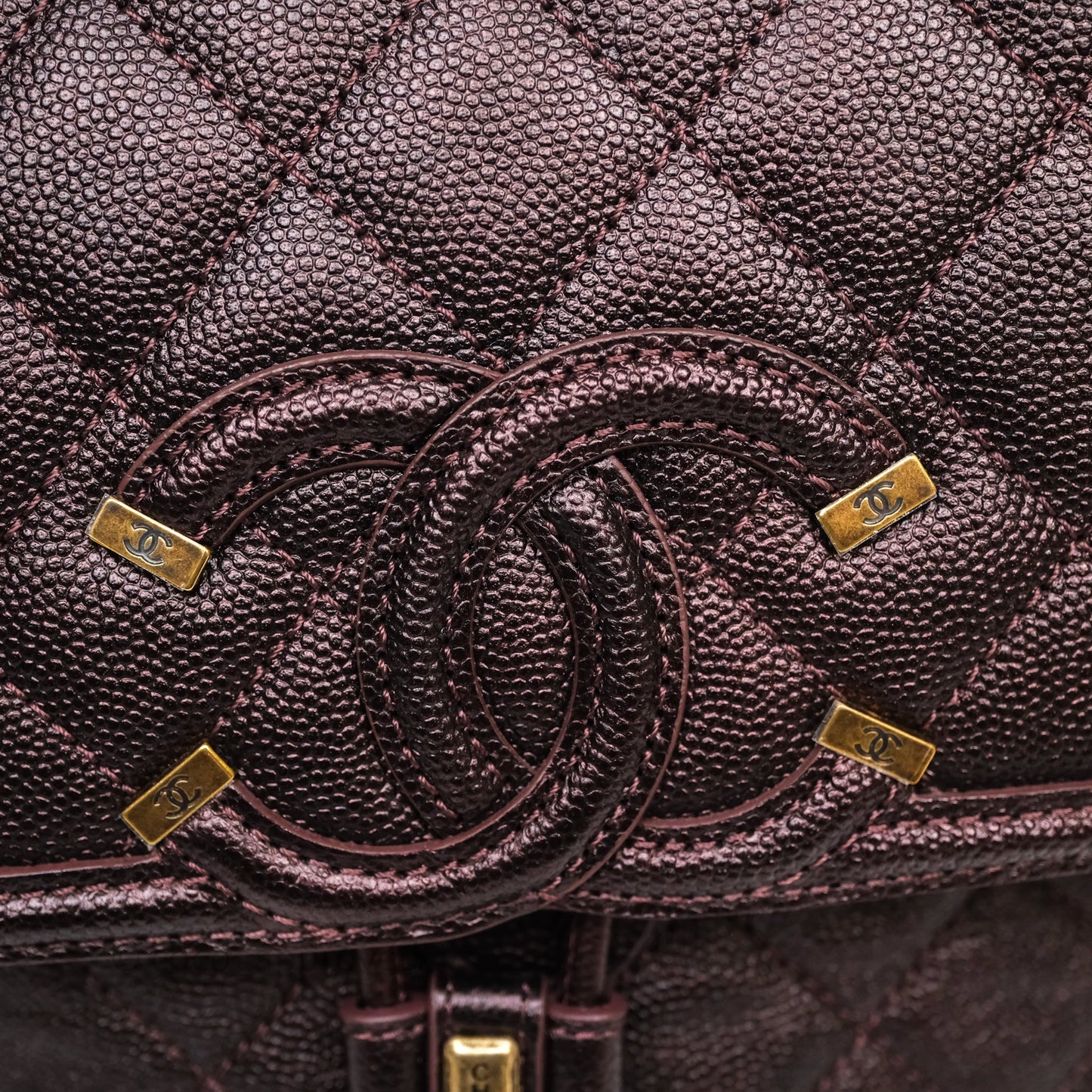 Chanel Quilted Filigree Backpack Iridescent Burgundy Caviar Aged Gold Hardware