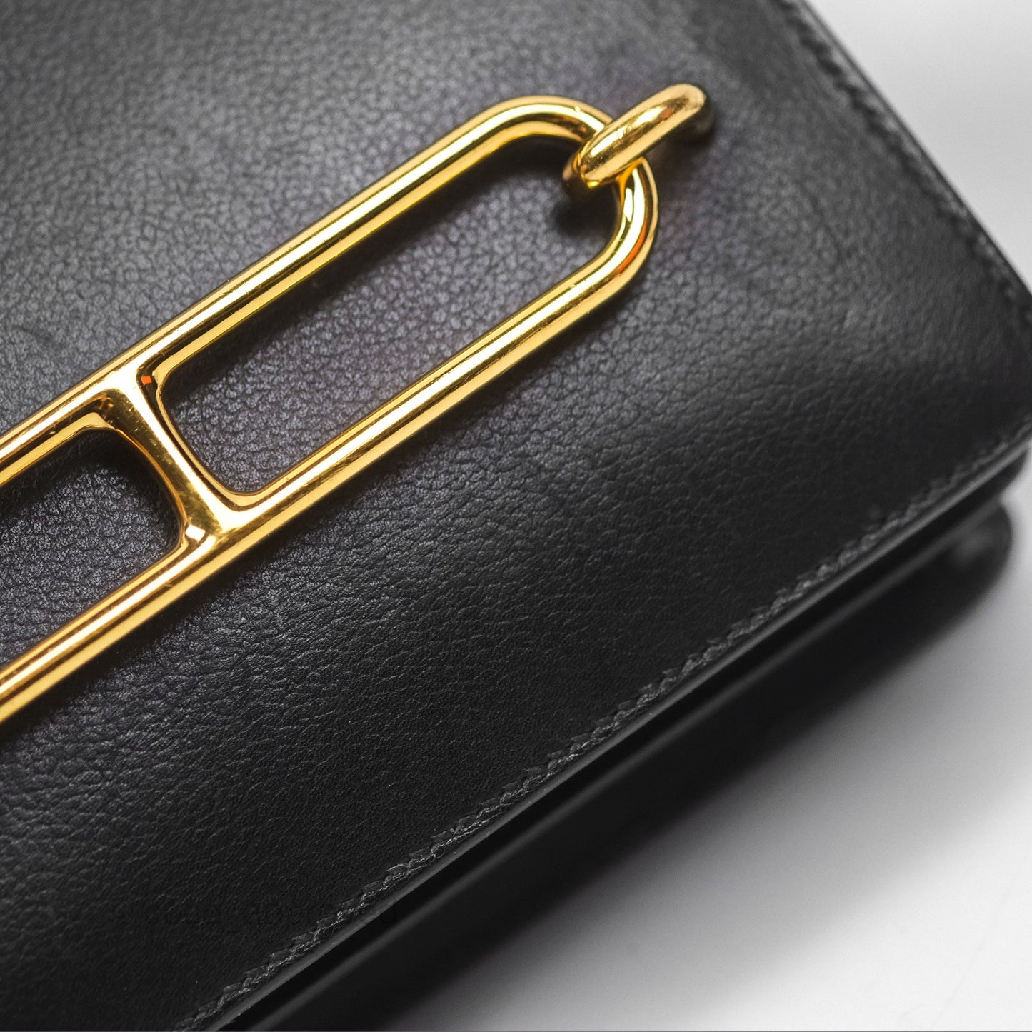 Hermès Roulis Mini 18 Noir 89 Veau Evergrain Gold Hardware