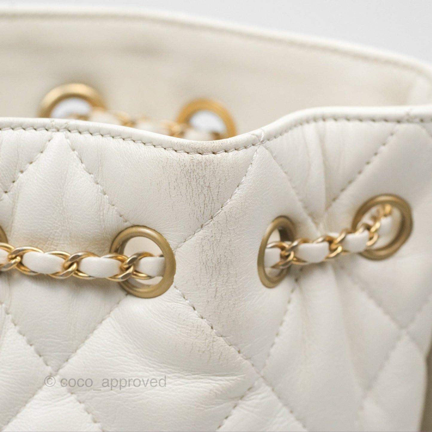 Chanel Quilted Drawstring Bucket Bag Ivory Lambskin Aged Gold Hardware