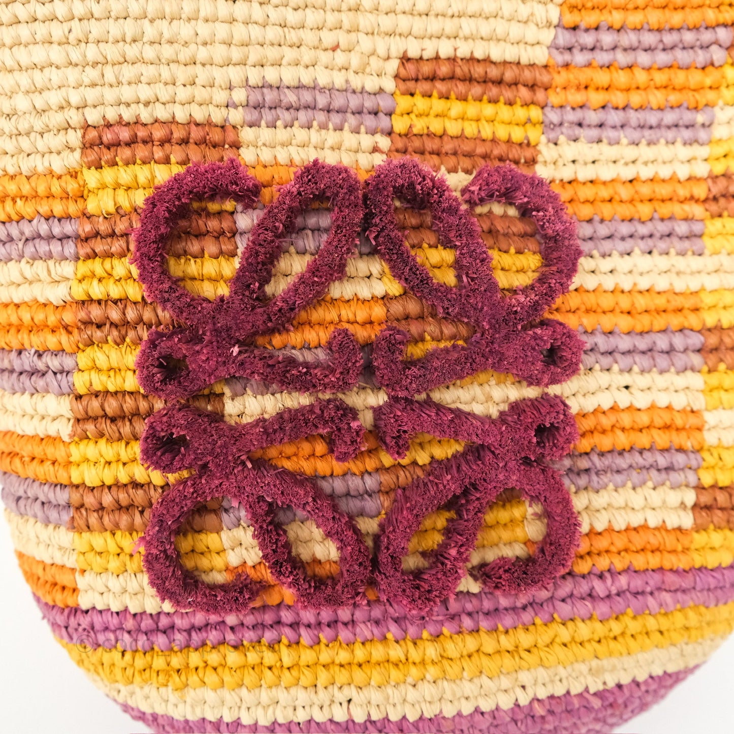 Loewe x Paula’s Ibiza Slit Mini Rainbow Raffia Bag